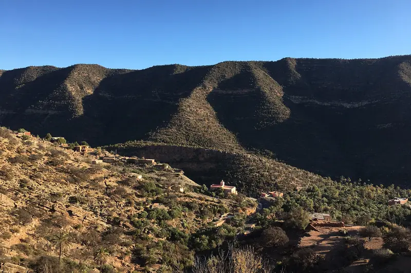 Village houses and green terraces in a valley of the Atlas foothills near Agadir